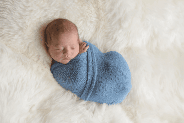 Baby-swaddled-in-blanket